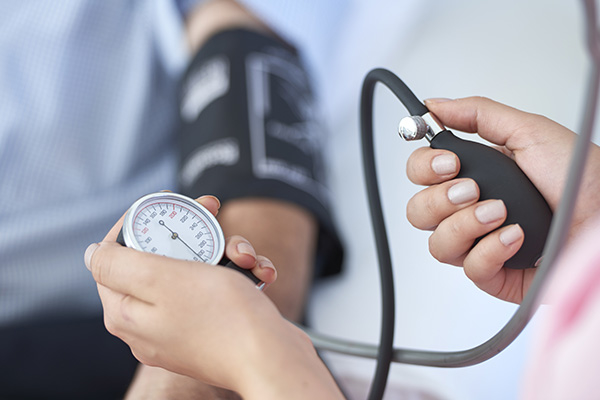Image of a patient having a blood pressure reading