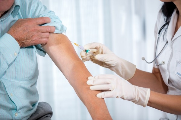 Image of a person getting a flu shot