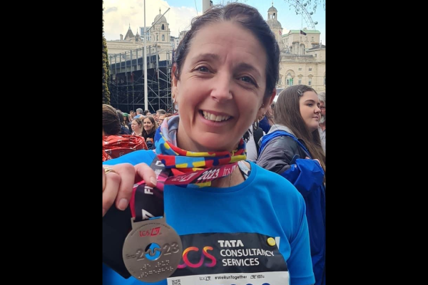 Paula Kelly holding her medal