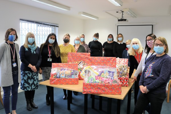 Corby staff donate hampers to Pen Green Centre